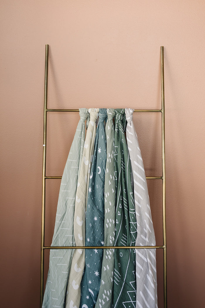 Mebie Baby Gender Neutral Infant Muslin Swaddle its 100% cotton.