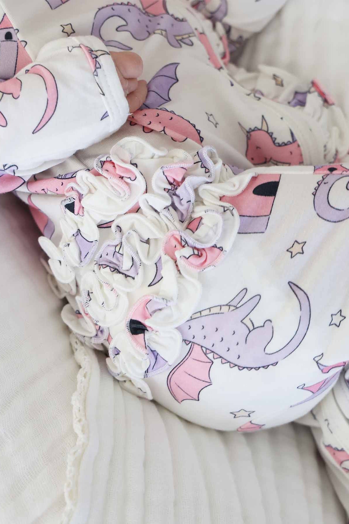 Dragon Adventure Ruffle Zipper Footie | Pink